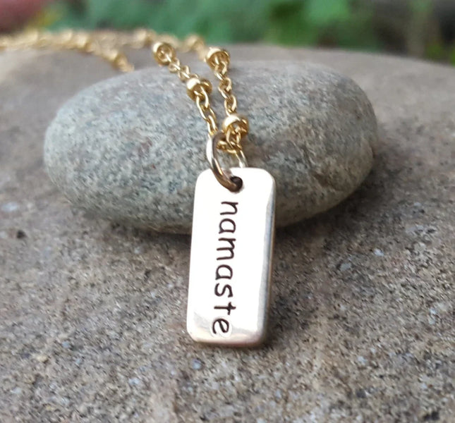 Tiny Namaste Necklace – Gold Word Tag on 16" Chain