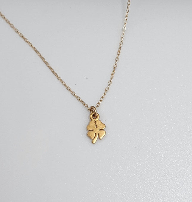 Tiny Gold Shamrock Necklace – Matte Vermeil Charm on 16" Chain