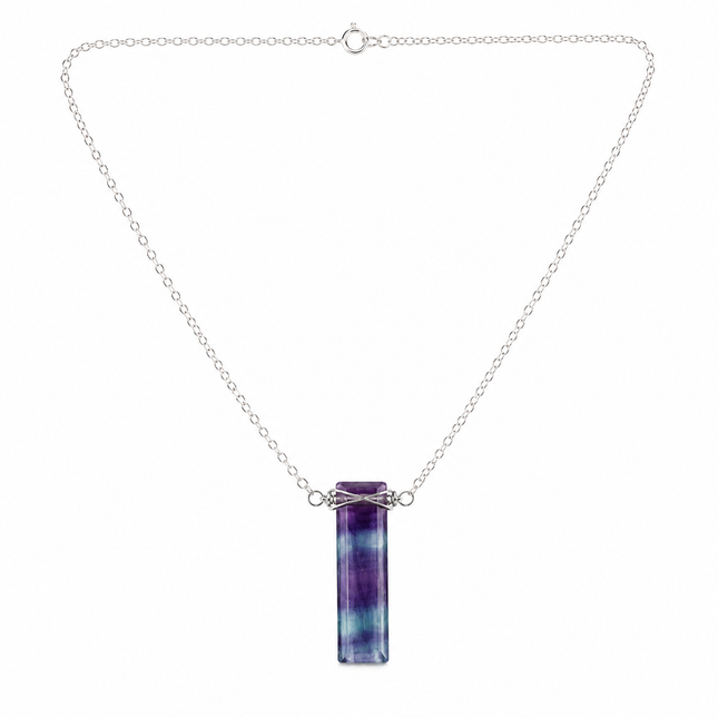 One purple and green fluorite bar necklace on a silver metal chain.