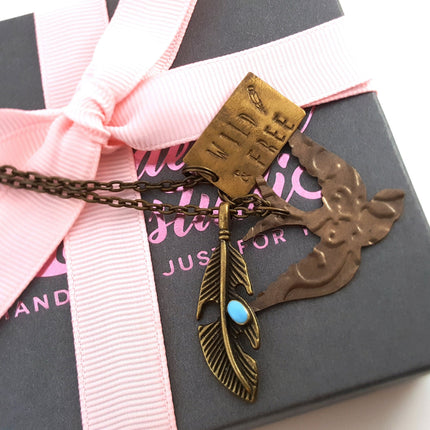 Wild and Free Charm Necklace – Brass Bird, Feather, and Handstamped Tag
