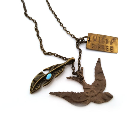 Wild and Free Charm Necklace – Brass Bird, Feather, and Handstamped Tag