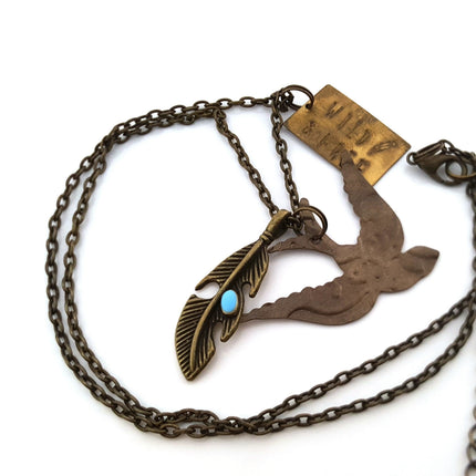 Wild and Free Charm Necklace – Brass Bird, Feather, and Handstamped Tag