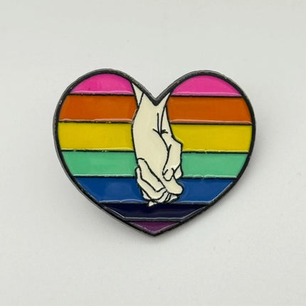 Holding Hands Pride Enamel Pin – Rainbow Heart “Love Is Love” Accessory